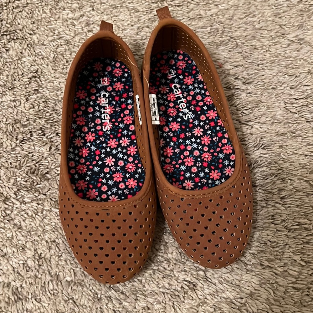 Children’s brown flats.